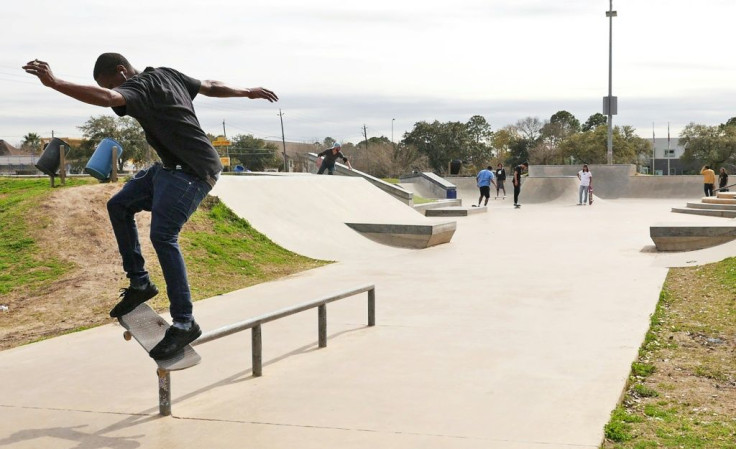 Skateboarder Dallis Thompson executes a slide at a skate park in Houston, Texas, on January 26, 2021