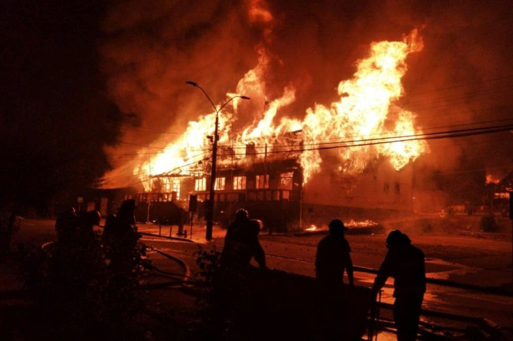 Protesters set fire to the building Municipality of Panguipulli during a demonstration over the police killing of a street artist