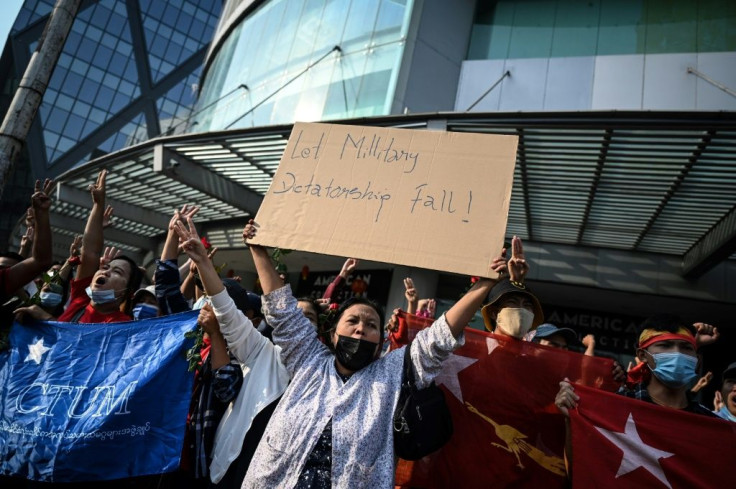 Protesters have defied a state of emergency to rally against the coup