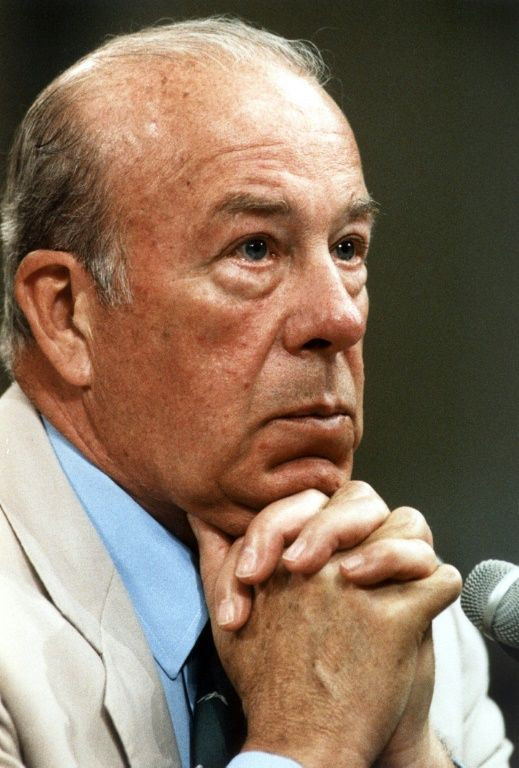 US Secretary of State George Shultz listens to a question during his first day of testimony before Iran-Contra investigators on July 23, 1987