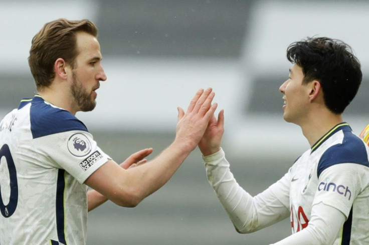 Tottenham's Harry Kane (L) celebrates with Son Heung-min