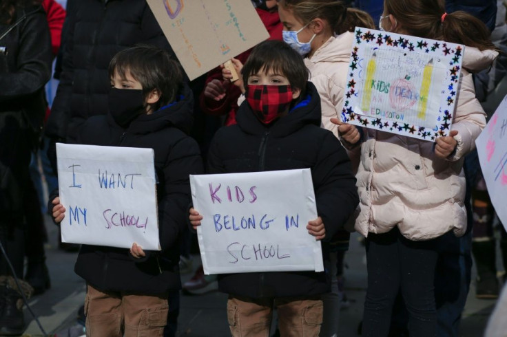 Children participate in a protest in New York calling for schools to reopen in November 2020