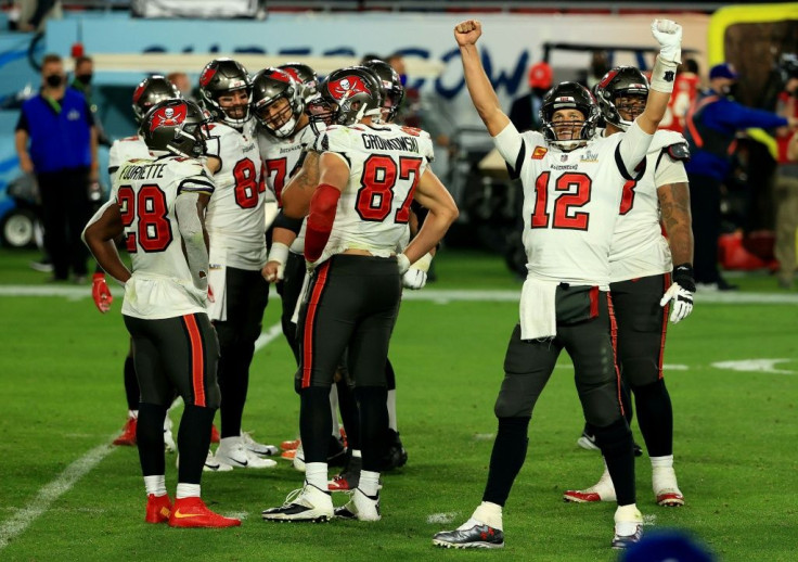 Tom Brady celebrates as the Tampa Bay Buccaneers storm to an emphatic Super Bowl upset over the Kansas City Chiefs