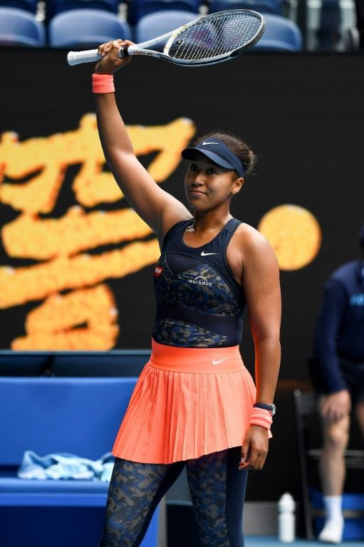 Japan's Naomi Osaka celebrates after winning her opening match against Russia's Anastasia Pavlyuchenkova at the Australian Open on Monday