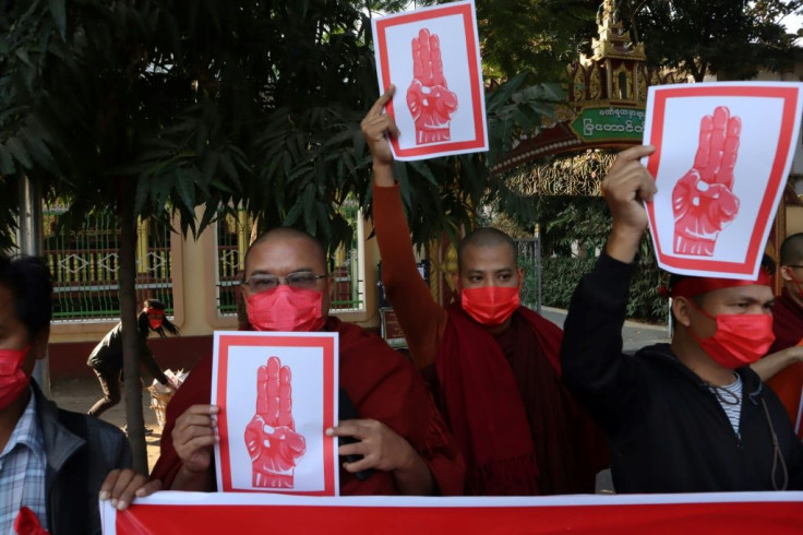 Protesters flashed the three-finger salute that has come to symbolise opposition to Myanmar's military coup