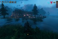 A Valheim player overlooks a fortified base in the middle of a lake