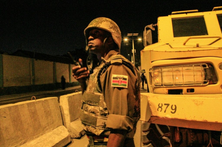 Perilous job: A Kenyan policeman with the African Union's peacekeeping mission in Somalia (AMISOM), on night patrol in Mogadishu