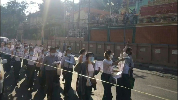 Anti-coup protesters rally across in Yangon on Tuesday, defying warnings from the military threatening "action" against large gatherings.