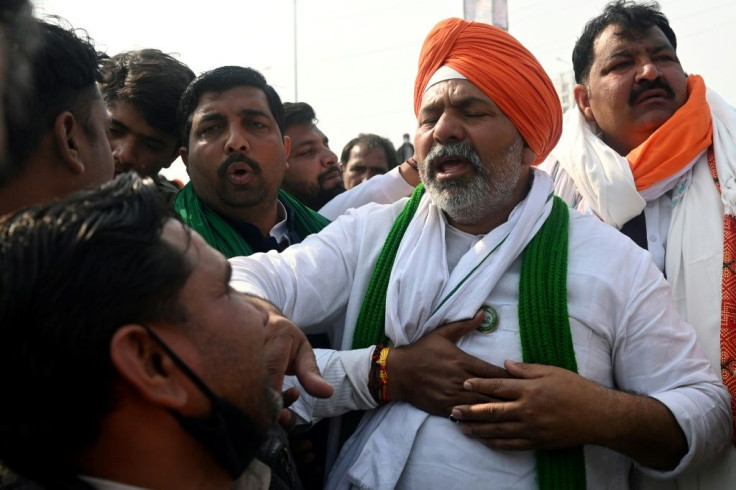 Rakesh Tikait (C) has revived a campaign by Indian farmers against agricultural reforms that they say will allow corporate giants to overtake the industry