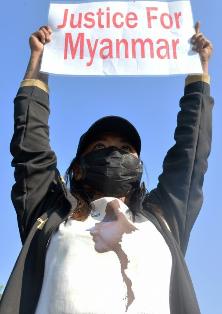 Many of the signs held up by Myanmar's anti-coup protesters are notably in English, highlighting the desire to appeal to an international audience
