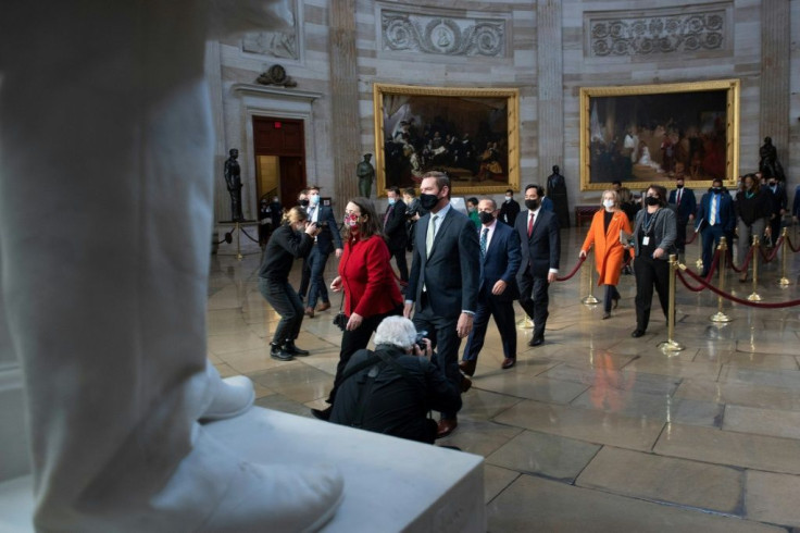 House impeachment managers walk to the Senate on the eve of the trial of former US President Donald Trump