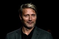 Danish actor Mads Mikkelsen stars in dark comedy "Another Round" as a middle-aged alcoholic who vows to get drunk every day along with three fellow high-school teachers