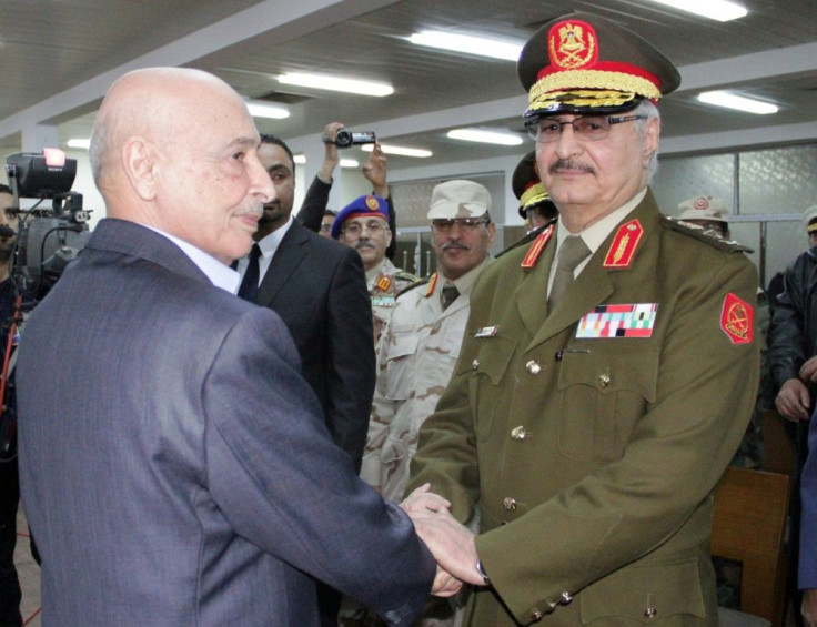 Libya is now divided between two rival camps, with the east controlled by an administration declared by the elected parliament and backed by military strongman Khalifa Haftar (R)