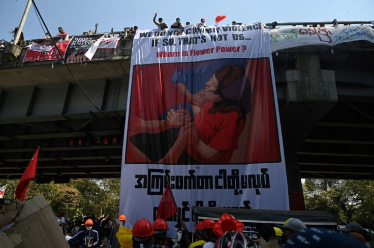 Two people were critically wounded in the incident -- including one woman who was shot in the head, images of whom are now gracing protest banners