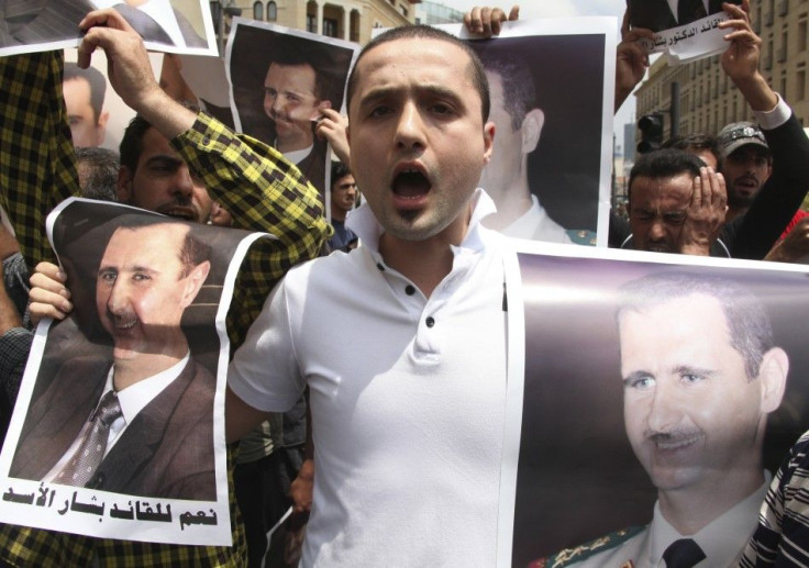 Protesters chant slogans in support of Syrian President Bashar al-Assad in Beirut