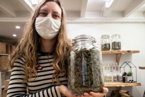 No high here: A saleswoman with a jar of CBD marijuana buds at "Le Chanvrier Francais" in Paris.