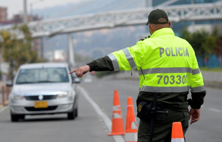 Colombian police stop vehicles in Bogota on February 10, 2021 following a report that ELN rebels planned to attack the city in the "next few days"