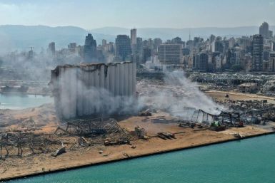Beirut's port was left devastated by a massive blast on August 4, 2020, here photographed one day after the explosion, including damaging containers of chemicals which are now being cleared
