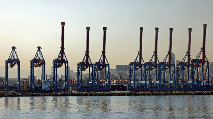 Cranes are pictured on October 26, 2020 at Beirut port; this month, a company has been clearing 52 containers of chemicals stored there for years