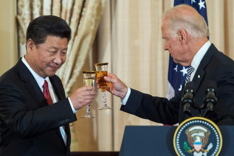 Then-Vice President Joe Biden and Chinese President Xi Jinping toast each other in 2015; late Wednesday Biden had his first phone call as US president with Xi.