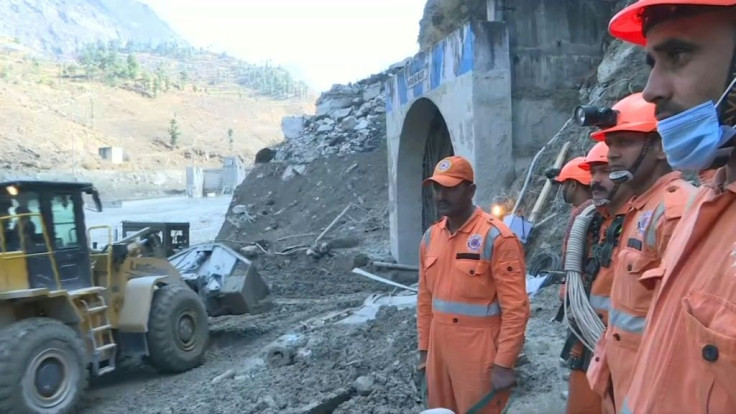 Indian rescue workers are looking for survivors, with the help of sniffer dogs, as they struggle to dig away tonnes of rocks and mud in a choked Himalayan tunnel three days after a devastating flash flood likely caused by a burst glacier in India's Himala