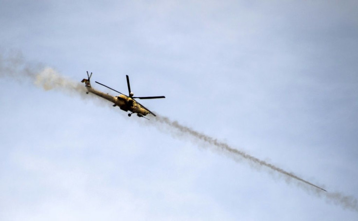 An Iraqi forces attack helicopter fires missiles on the Islamic State in May 2017