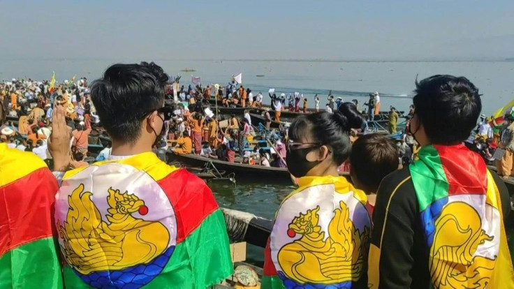 Hundreds protest from their boats on Myanmar's Inle Lake