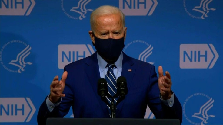 US President Joe Biden says his government has signed deals to acquire 200 million more Covid-19 vaccine doses, after touring the National Institutes of Health in Maryland.