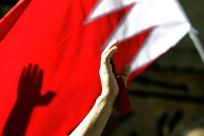 A Bahrain flag is waved during a Shiite funeral in the capital Manama, in this file photo taken on March 22, 2011