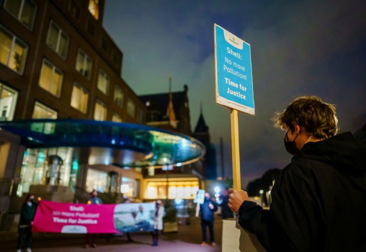 Dutch environmental activists staged a protest outside Shell offices in The Hague over the pollution in Nigeria