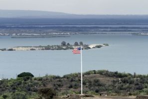 An American flag flies at Hospital Cay on May 5, 2012 in Guantanamo Bay, Cuba: the Biden administration wants to close the prison on the military base
