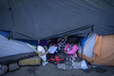 Children are seen in a migrant camp in Ciudad Juarez, Mexico, in 2019
