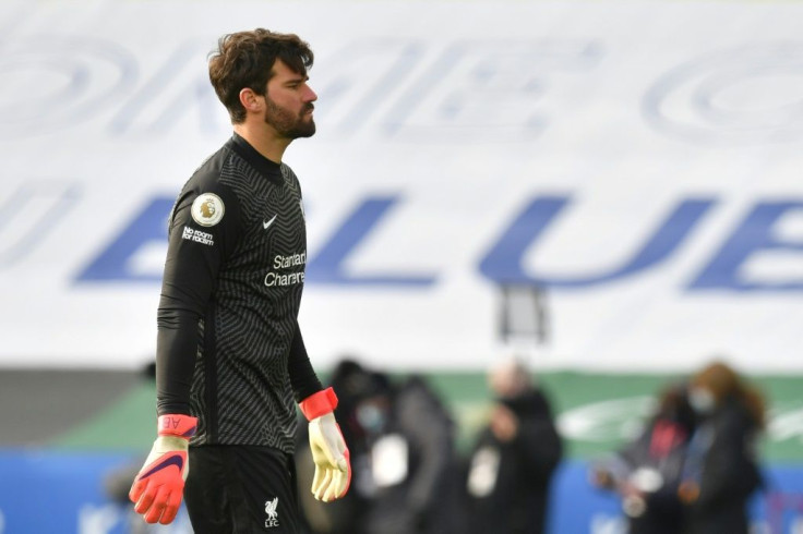 Feeling blue: Alisson Becker's blunder handed Jamie Vardy Leicester's second goal