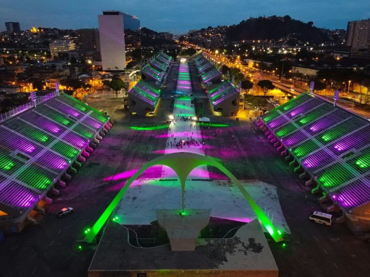 Coloured lights illuminate the Marques de Sapucai avenue in Rio de Janeiro, Brazil in homage to the samba schools that will not be able to perform at the annual carnival parade