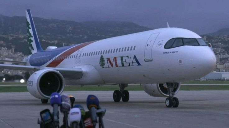 IMAGESA Middle East Airlines plane carrying an expected first batch of 28,500 doses of Pfizer/BioNTech flown in from Belgium lands in Beirut airport, a day before vaccinations kick off in the crisis-hit Mediterranean country.