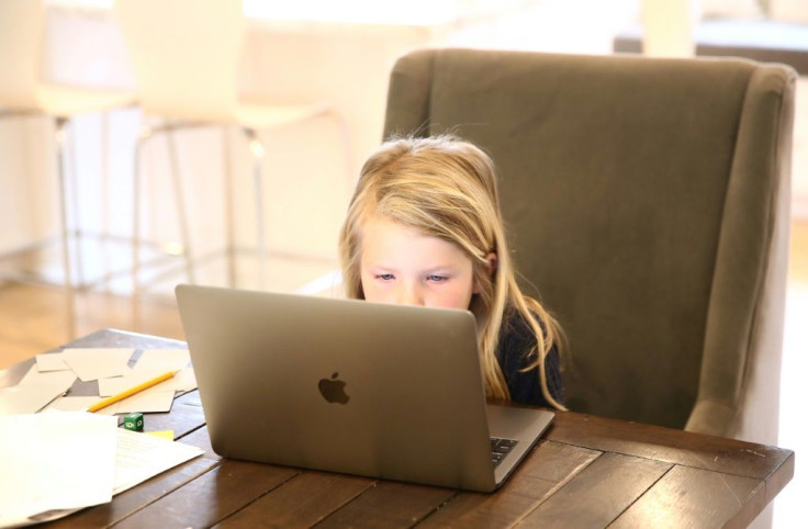 Evianna Van Santvoord, a kindergarten student, follows online courses at home on March 18, 2020 in San Anselmo, California