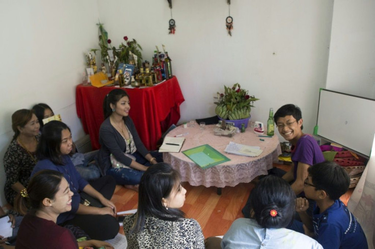 Popular young sorcerer Linn Nhyo Taryar (R, shown with his students in this file photo) was taken away by police after participating in the Yangon protests