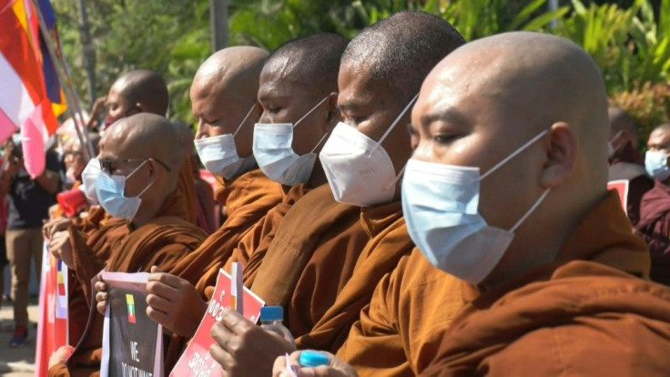 Monks pray against coup outside US embassy in Myanmar