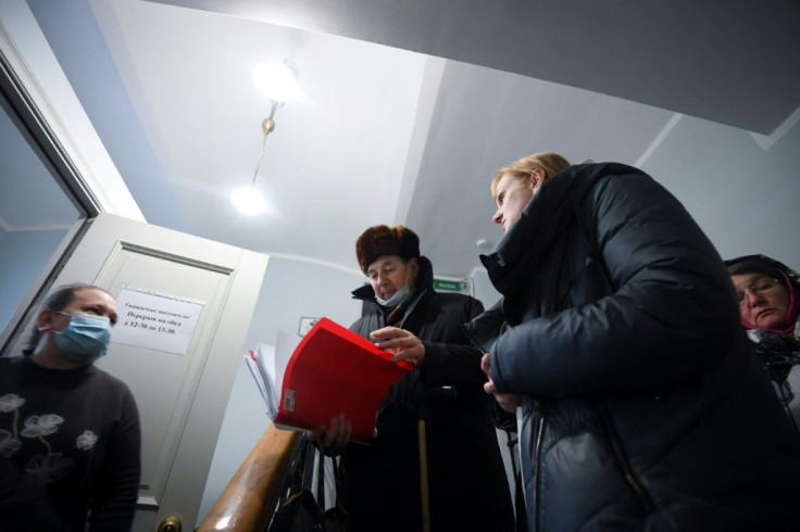 Many of the visitors who queue for packages containing buckwheat, sugar, and tea are retired but there are also those who have lost their jobs or had their salaries cut