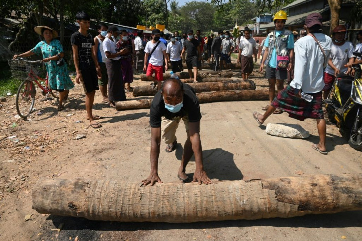 Residents rolled tree trunks onto the road to block police vehicles and escorted away officers who were attempting to return striking railway employees to work