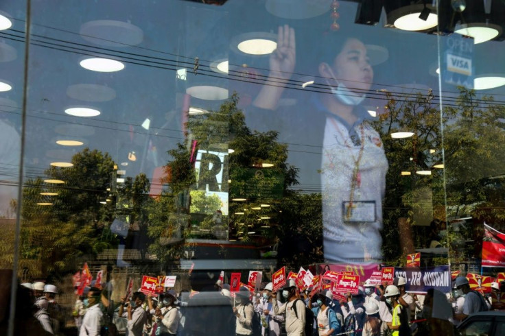 Thousands in Yangon returned to key intersections around the city in a ninth straight day of street protests