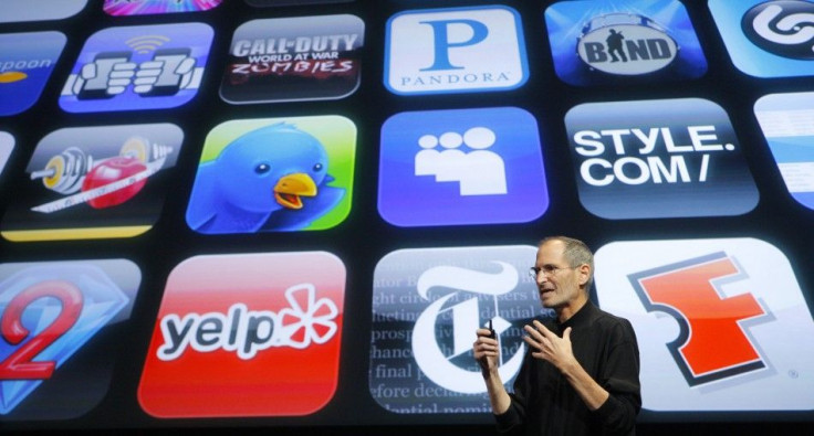 Apple Inc. CEO Steve Jobs speaks in front of the display showing buttons of various apps during the iPhone OS4 special event at Apple headquarters in Cupertino