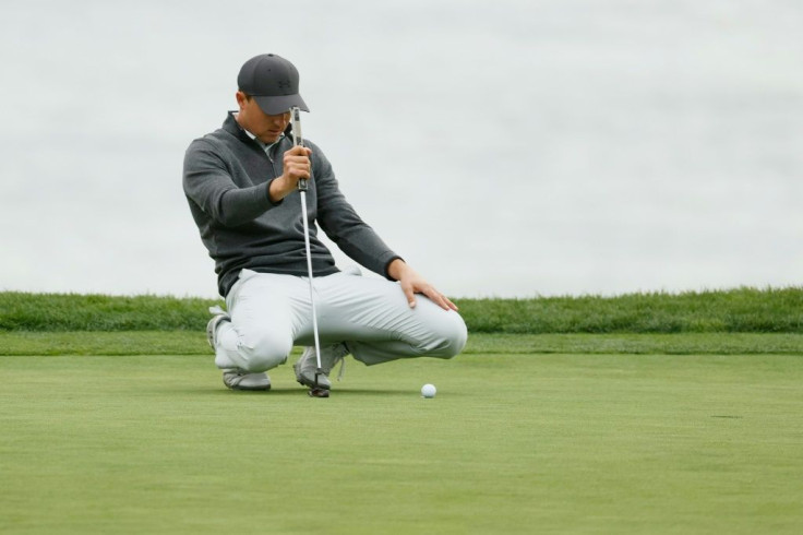American Jordan Spieth lines up a putt on the way to a final-round 70 and a share of third place in the US PGA Tour Pebble Beach Pro-Am