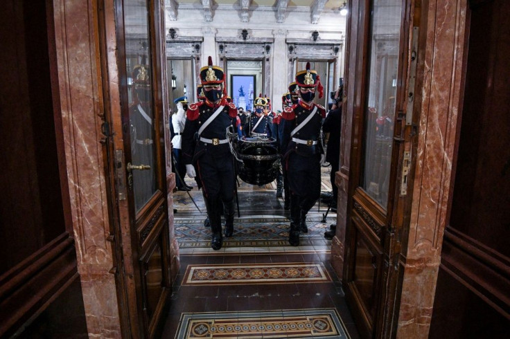 This handout picture released by the Argentine Senate shows the coffin of former Argentine president Carlos Menem, arriving at the Congress in Buenos Aires, to lie in state