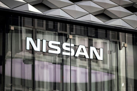 Japanese auto giant Nissan has denied that it is in talks with Apple to develop self-driving cars