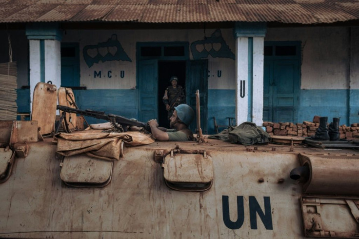 A UN peacekeeper patrols the Central African Republic city of Bangassou, which was seized by rebels