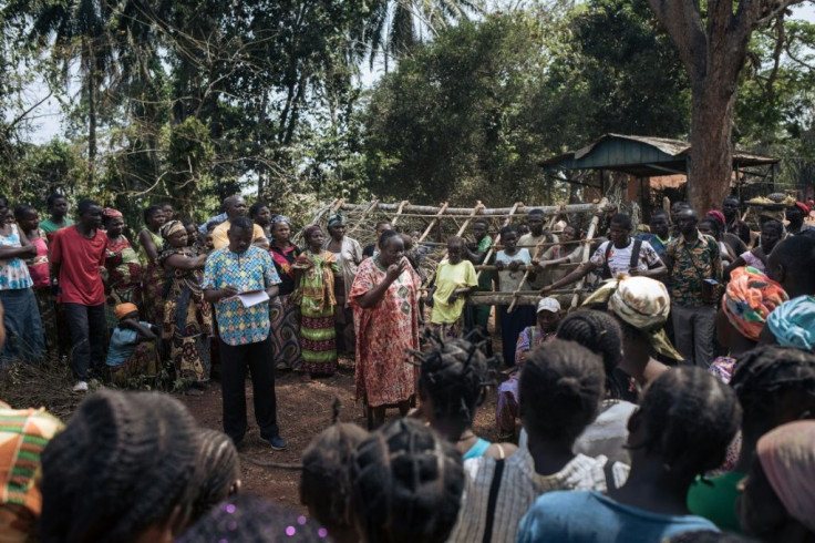 Pierrette Benguere, the head  of Mbomou prefecture, speaks to those displaced from Bangassou by the violence