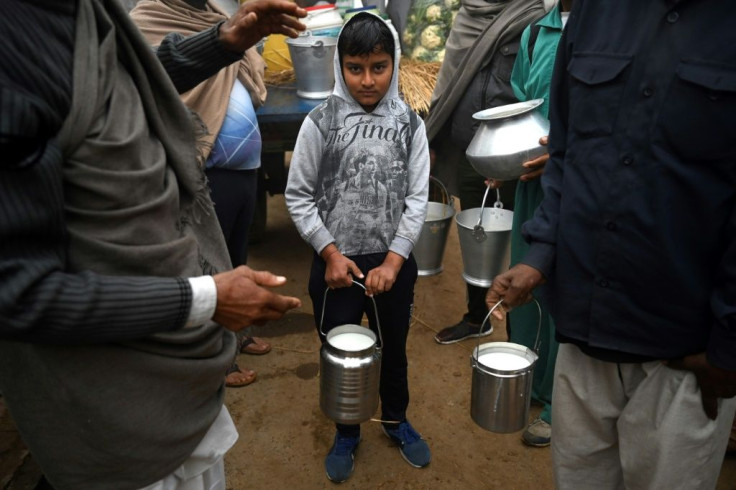 Villagers donate wood, vegetables and fresh milk, which are then transported to the camps by tractor