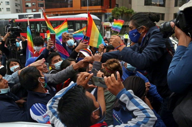 Ecuadorian presidential candidate Yaku Perez, pictured February 12, 2021 greeting his supporters during a demonstration in front of the National Electoral Council in Quito, has alleged electoral fraud in the first round of voting