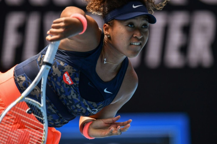Naomi Osaka serves on her way against Hsieh Su-wei. The world number three hit 24 winners in easing to victory in 66 minutes